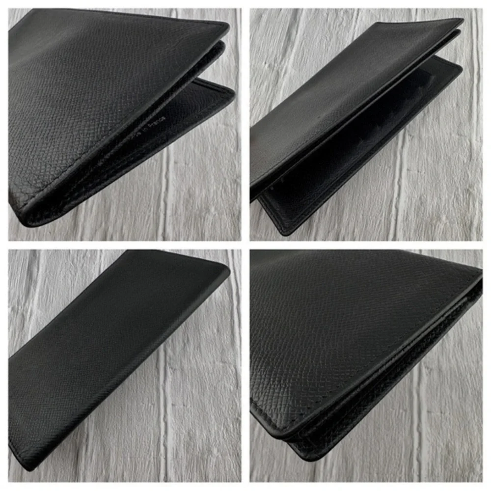 AUTHENTIC Louis Vuitton Taiga wallet. Previously owned. Color: Black.